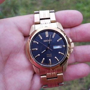 Gold tone watch